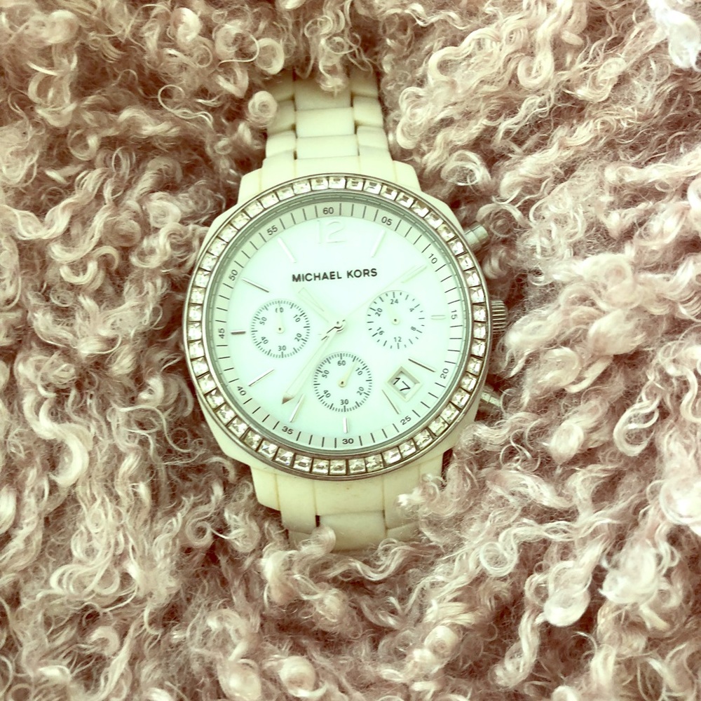 White Michael Kors bling watch.